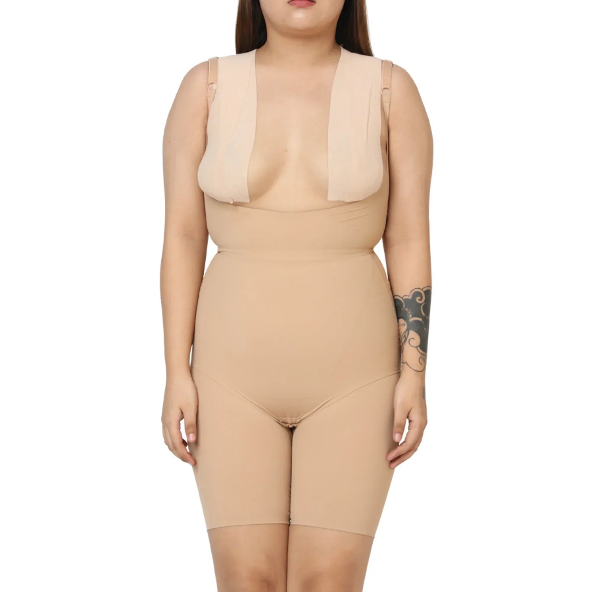 Beige full bodysuit featuring adjustable straps and a flattering design.