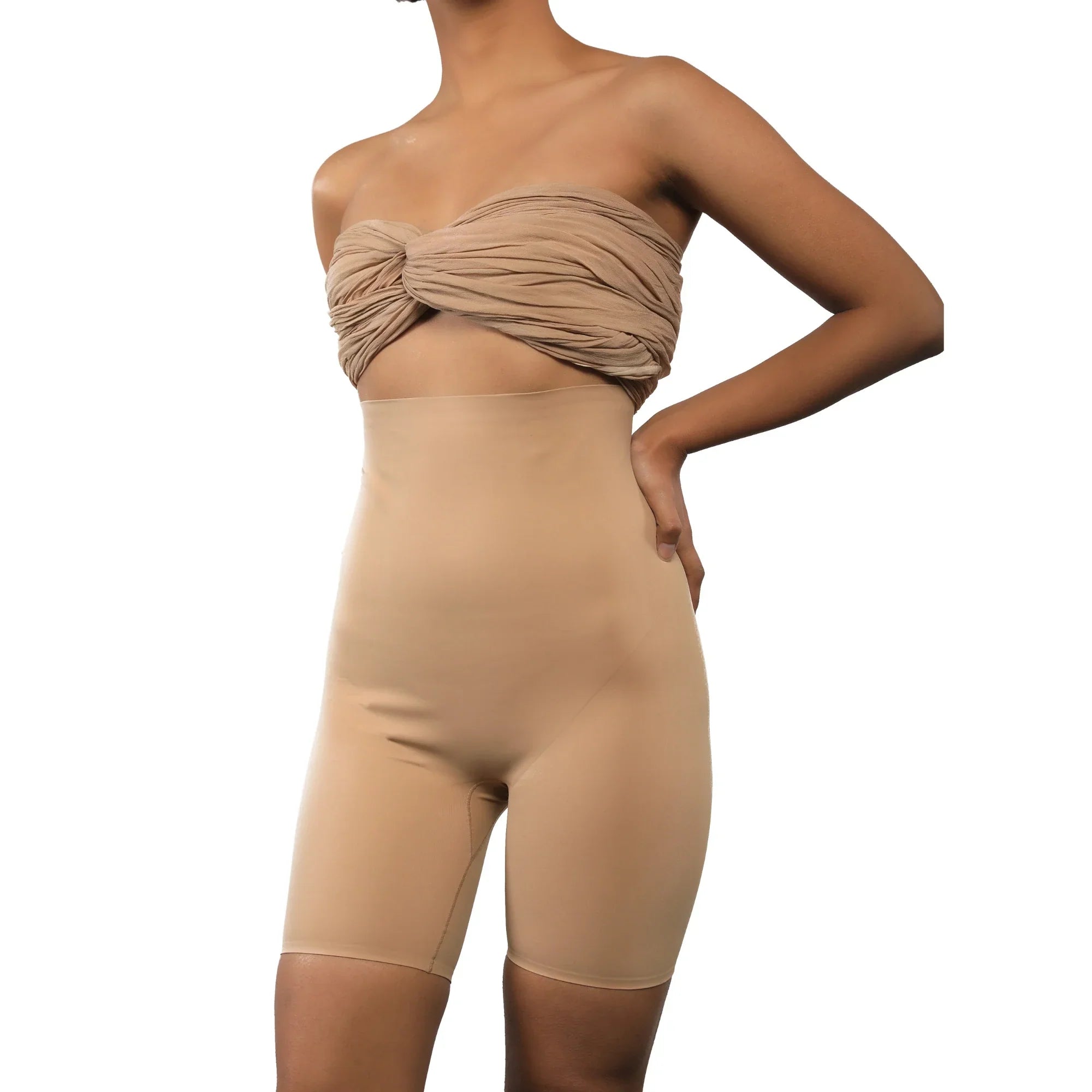 Seamless women's shapewear shorts in nude for a smooth silhouette.