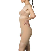 Nude seamless shaping bodysuit for a smooth silhouette.
