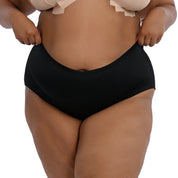 Plus-size model showcasing "Cheeky" black underwear.