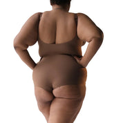 Brown bodysuit on model showcasing back view and fit.