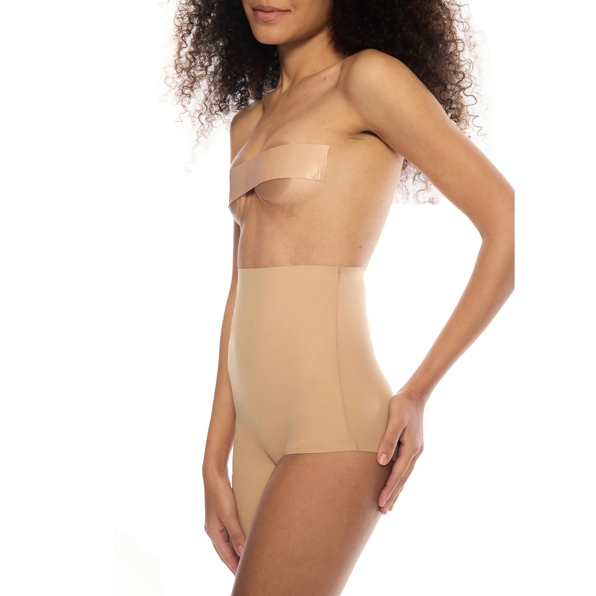 Model wearing Right Leg Shorty shapewear in nude color.