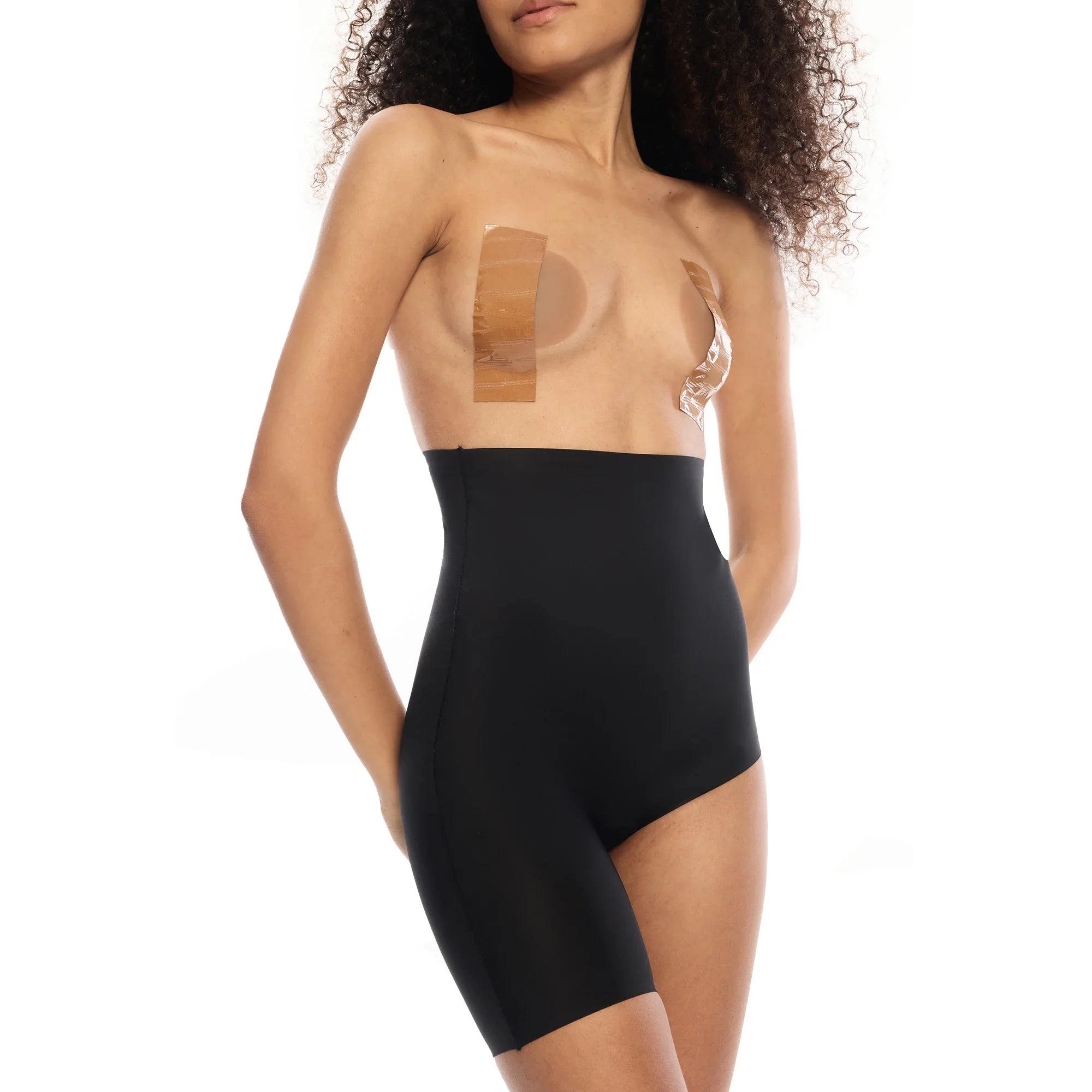 Model wearing Right Leg Shorty black shapewear shorts.