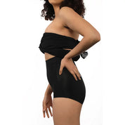 "Model showcasing Super Edge high-waisted black shapewear shorts."