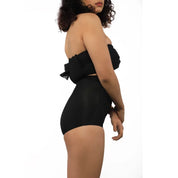 Elegant black high-waisted bikini with ruffle detail, perfect for summer.