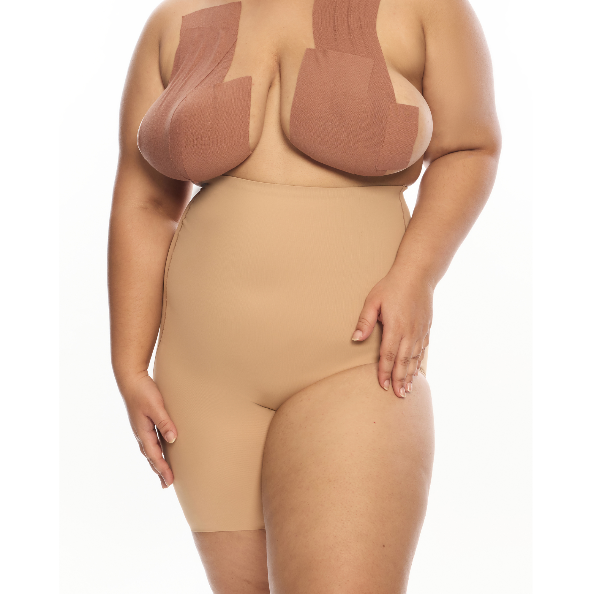 "Model wearing Right Leg Shorty shapewear in nude color."