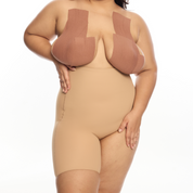 "Model wearing Right Leg Shorty seamless shapewear in nude color."