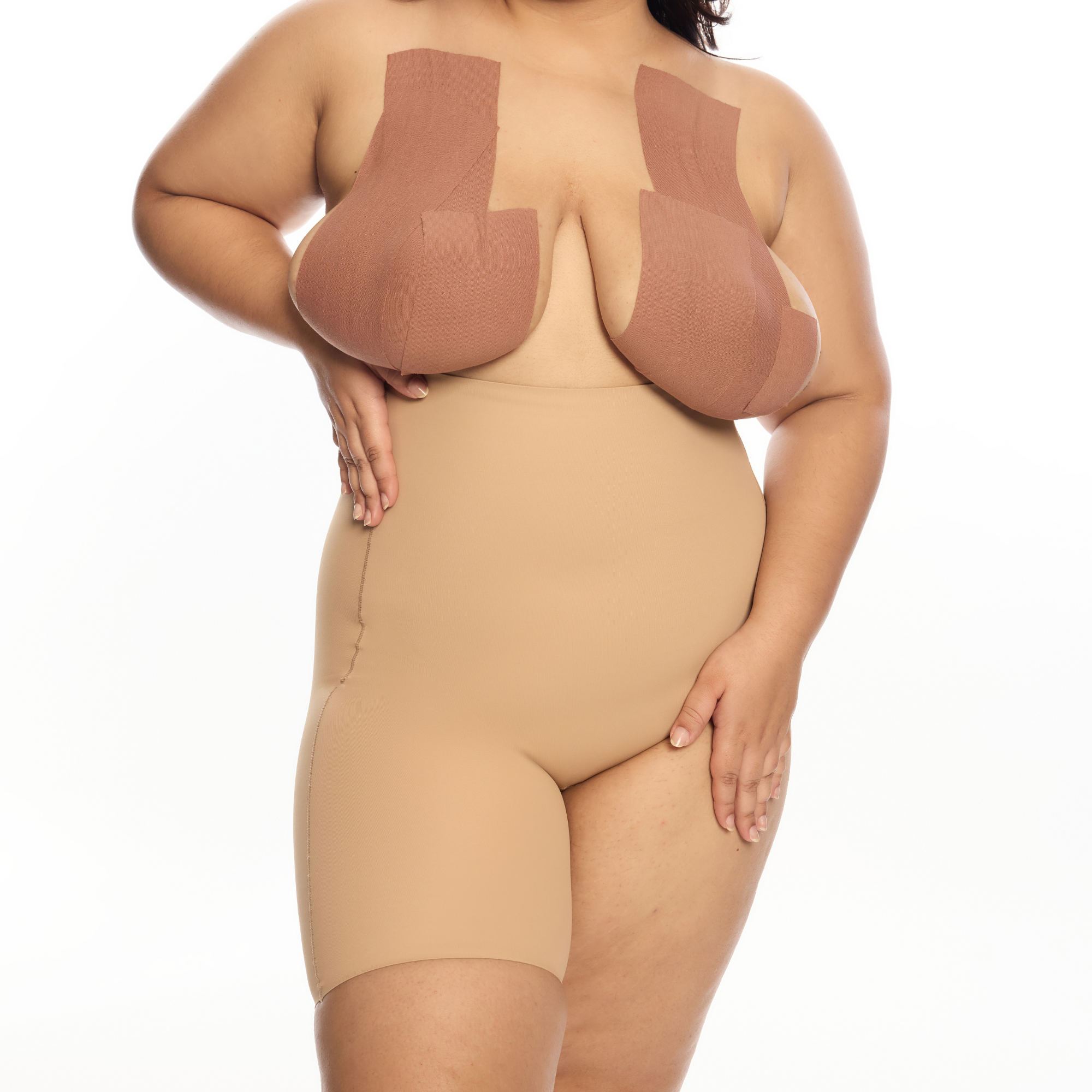 "Model wearing Right Leg Shorty seamless shapewear in nude color."