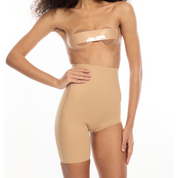 Model wearing Right Leg Shorty shapewear in nude color.
